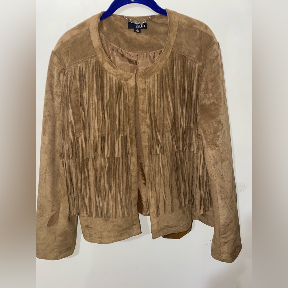Tan fringe jacket. Very 70s